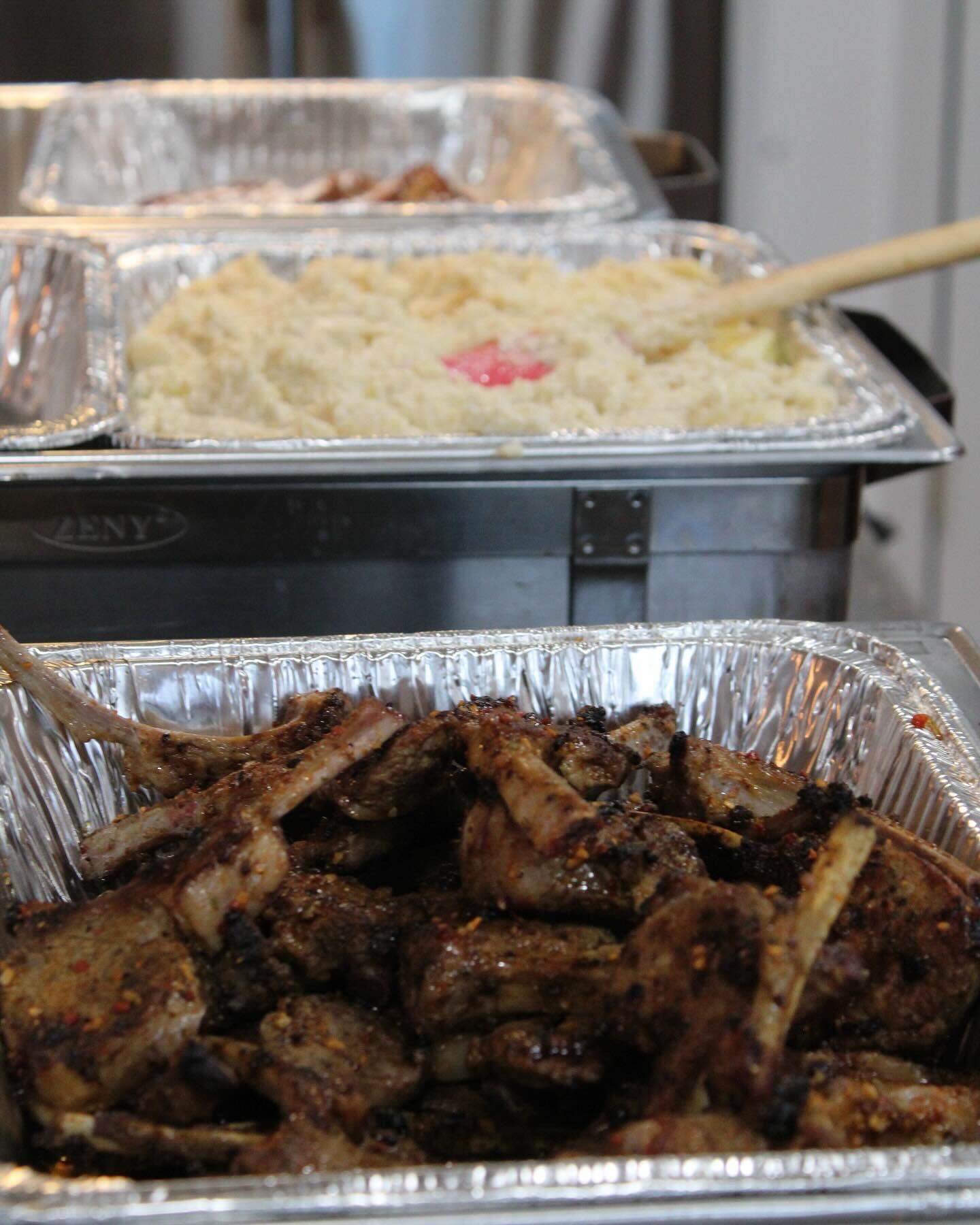 elegant catering setup with various dishes and decorations